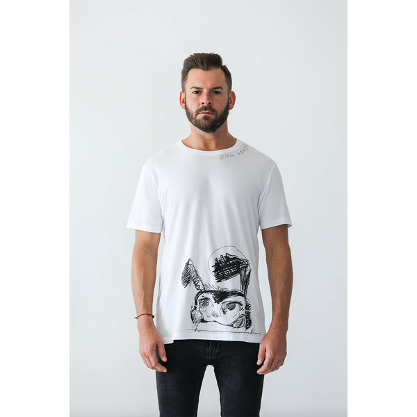 Icebreaker Collection T-Shirt, Men's, White | Hush Brand Apparel | BON APPETIT, bearded young man wearing t-shirt with black ink rough sketch of crazed looking bunny along bottom edge of shirt, bon appetit written along right collar - facing camera